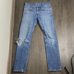 Wrangler blue slim denim jeans with ripped hole